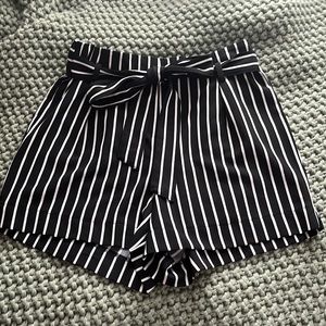HAVE.. black and white striped stretchy dress shorts with tie.